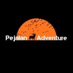 Logo for Pejalan Adventure featuring an orange half-sun with a deer silhouette and flocking birds on a black background, with bold white text.