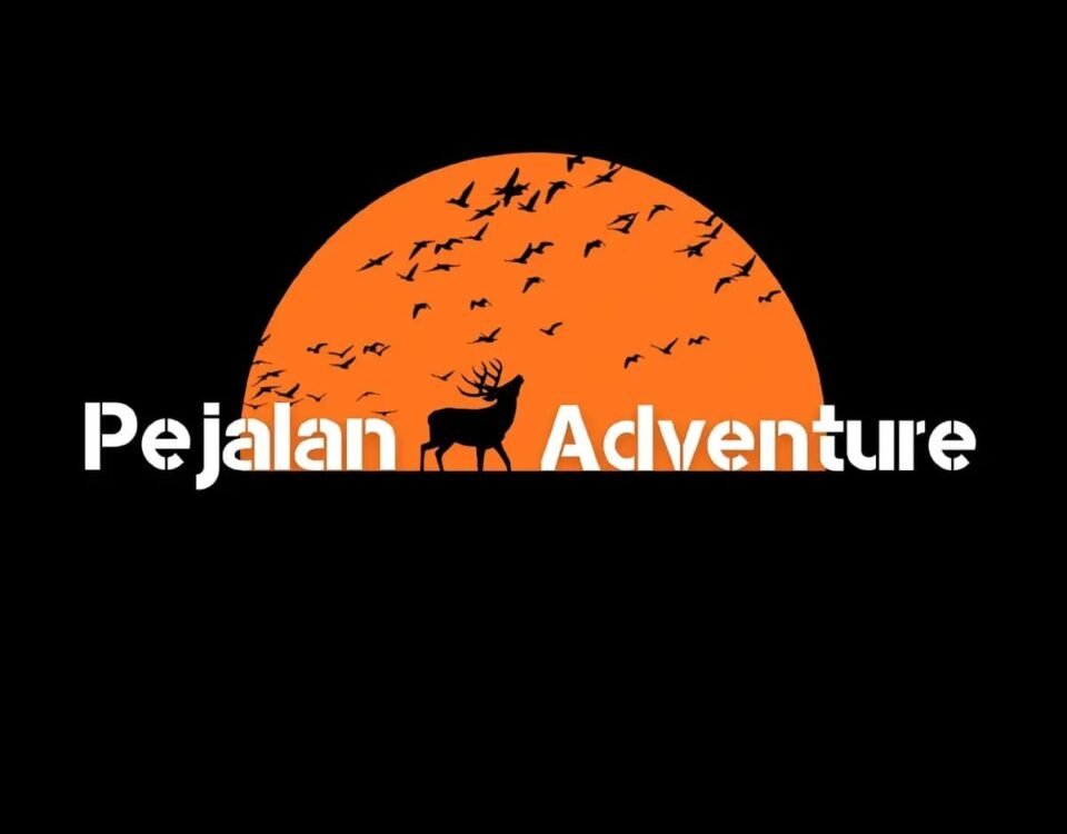 Logo for Pejalan Adventure featuring an orange half-sun with a deer silhouette and flocking birds on a black background, with bold white text.