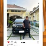 WhatsApp Image 2026-08-22 at 074022 - Dyantransport Man in dark shirt and sunglasses stands beside a black Toyota SUV in a driveway in front of a yellow house.