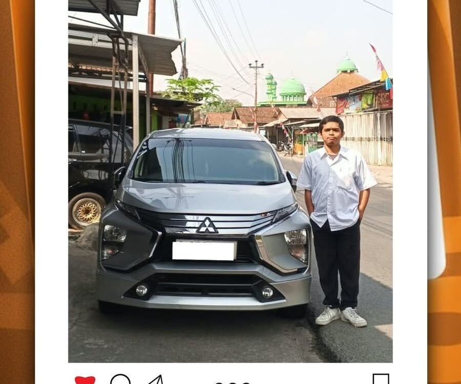 Man standing beside a silver Mitsubishi SUV on a street; promotional image for driver pickup service in Ungaran, Sleman route.